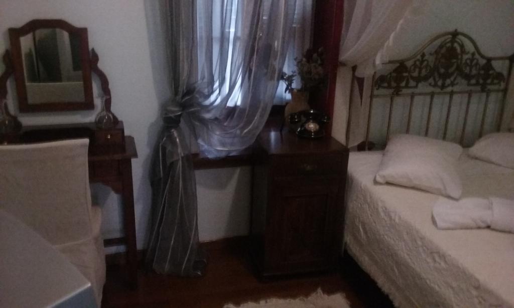 Boutique Palladio Portariá Quarto foto